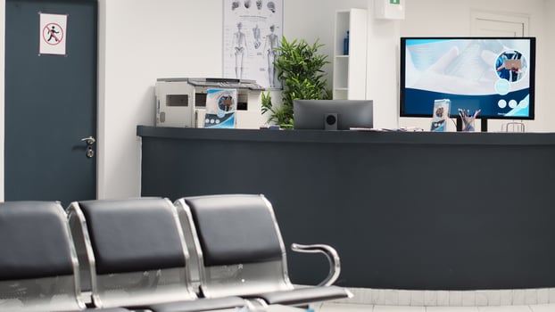 Hospital reception counter in hallway and waiting room, medical checkup examination in health care clinic. Waiting area with seats at clinical diagnostic center, emergency service. photo