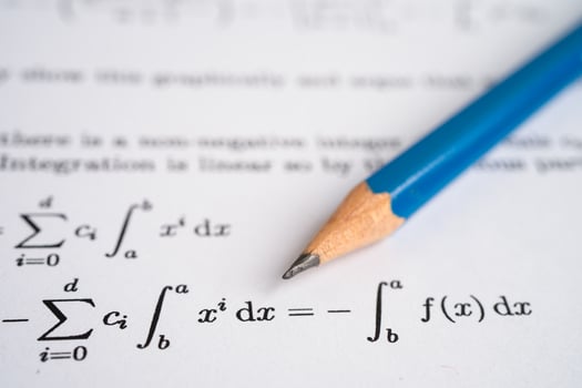 Pencil on mathematic formula exercise test paper in education school. photo