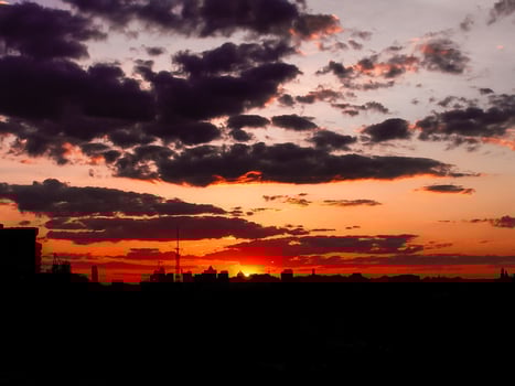 Autumn red sunset with a purple sky photo