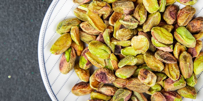 pistachios peeled without shell delicious nut delicious healthy eating cooking appetizer meal food snack on the table photo