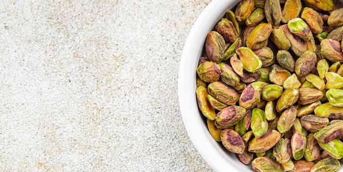 pistachios peeled without shell delicious nut delicious healthy eating cooking appetizer meal food snack on the table photo