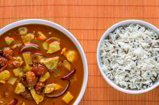 Thai yellow curry with chicken and rice photo