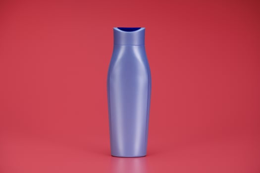 Blank Label Shampoo Bottle or Shower Gel on Pink Background photo