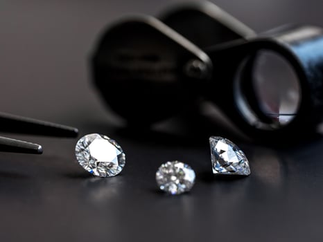 Diamond and jeweler loupe photo