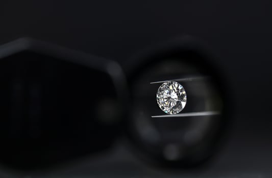 Round Cut Diamond in Jewelry tweezers photo