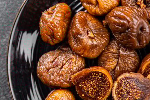 figs dried fruit smoked delicious healthy eating cooking appetizer meal food snack on the table copy space food background photo