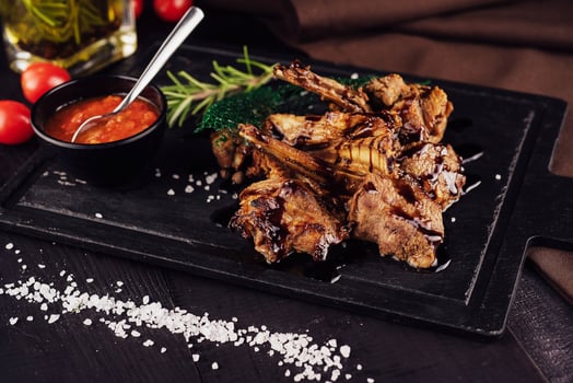 BBQ Grilled lamb chops steaks on board photo