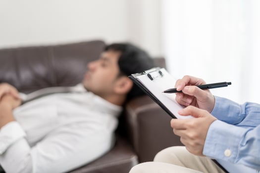 man with mental health problems is consulting. psychiatrist is recording the patient's condition for treatment. encouragement, love and family problem, bipolar , depression patient, protect suicide photo