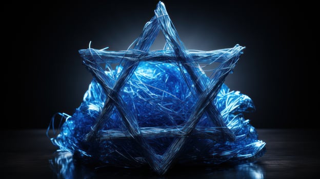 Star of David made of shiny blue tinsel photo
