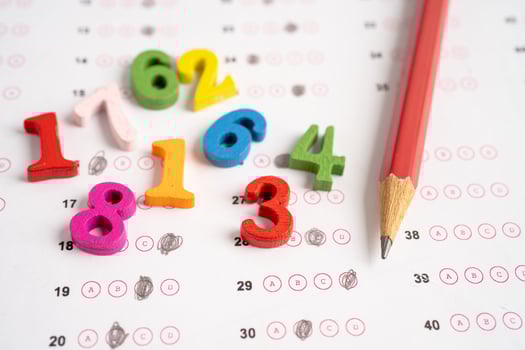 Math number and pencil on answer sheet paper, Education study testing learning teach concept. photo