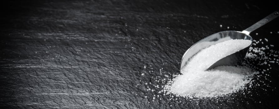 Salt background . On black table. photo