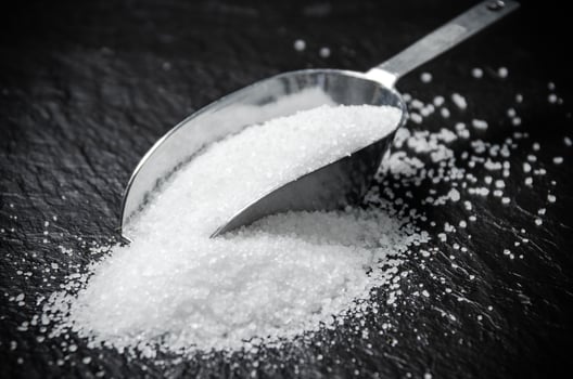 Salt background . On black table. photo
