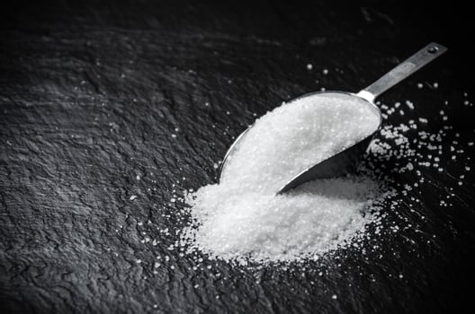 Salt background . On black table. photo