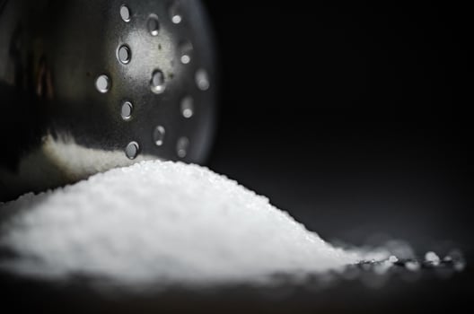Salt background . On black table. photo