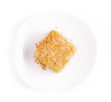 Slice of Napoleon Cake on top view photo