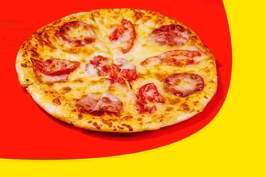 Pizza with tomatoes with cheese and salami photo