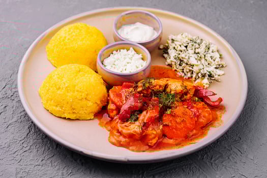 Porridge from corn flour with chicken photo
