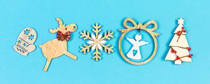 Banner top view of holiday ornament made of Christmas decorations on colorful background. New Year time concept with copy space photo
