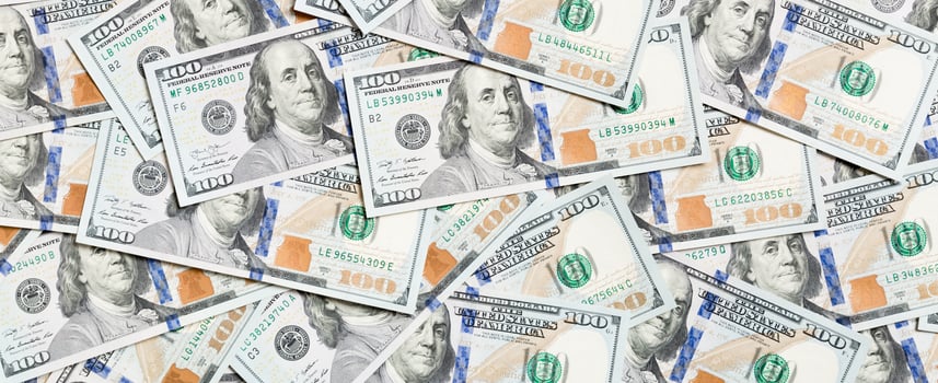 Top view of American money background. Pile of dollar cash. Paper banknotes concept photo