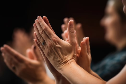 People listening and clapping at conference and presentation. AI Generated photo