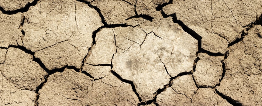 cracks in the ground background, black earth photo