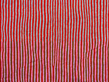 close up red striped fabric background photo