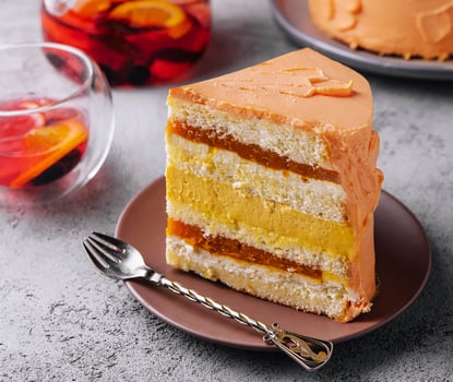 Delicious mango and passion fruit mousse cake photo