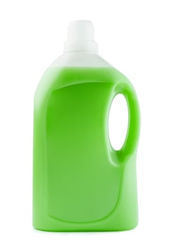 Plastic clean bottle full with green detergent photo