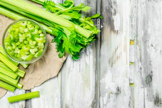 Pieces of celery in a bowl. photo