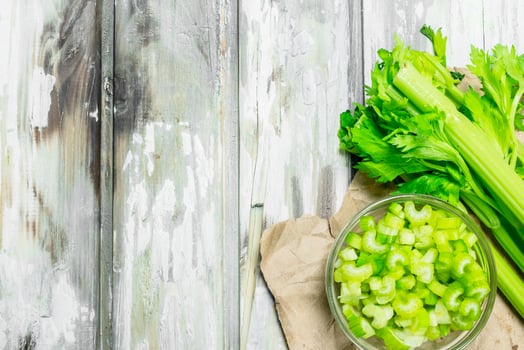 Pieces of celery in a bowl. photo