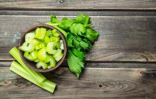 Pieces of celery in a bowl. photo