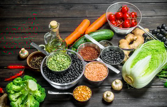Organic food. Variety of healthy fruits and vegetables with legumes . photo