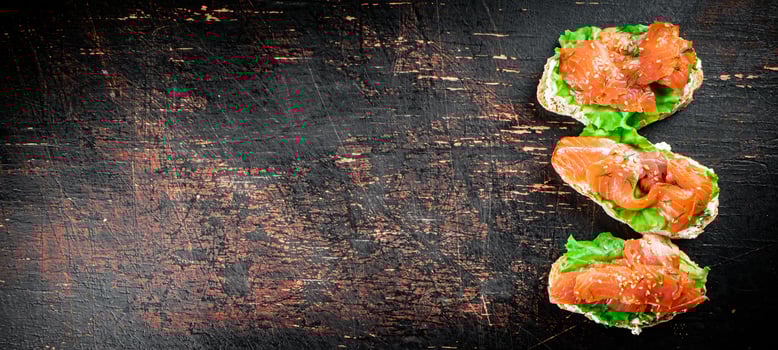 Sandwich with salmon and herbs. photo