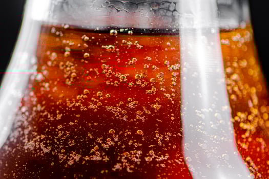 Apple juice with air bubbles. photo