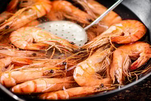 Cooking shrimp in water. Macro background. photo