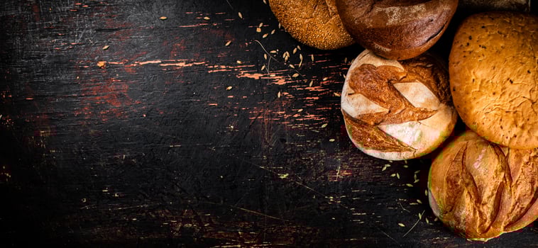 A variety of delicious bread on the table. photo