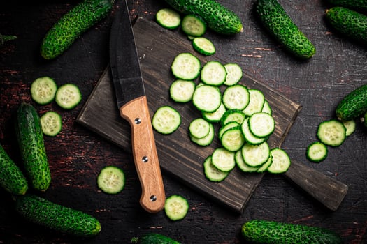 Cucumbers cut on a cutting board. photo