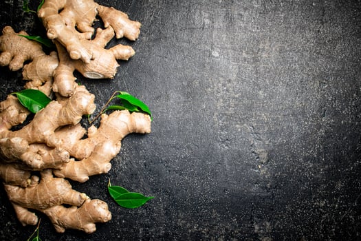 Fresh ginger root with leaves. photo