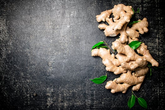 Fresh ginger root with leaves. photo