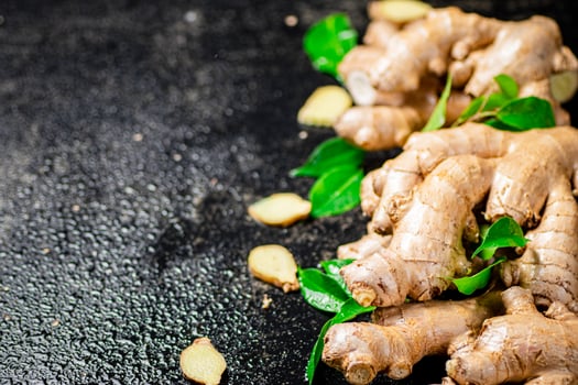 Fresh ginger root with leaves. photo