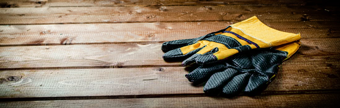 A pair of construction gloves on the table. photo