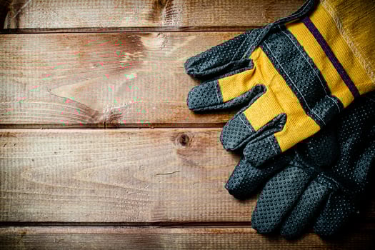 A pair of construction gloves on the table. photo