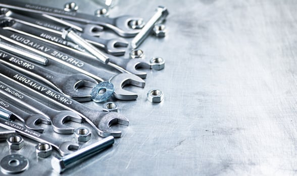 Wrench with nuts and bolts. photo
