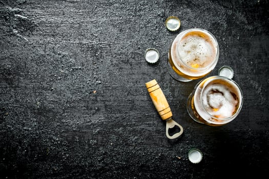 Glasses of beer and opener. photo