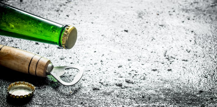 Opener, beer glass bottle and cover. photo