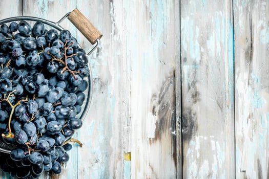 black grapes in saucepan. photo
