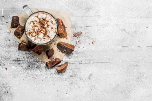 Hot chocolate with chunks of bitter chocolate and marshmallows. photo