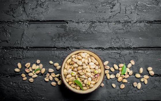 Pistachios in the bowl. photo
