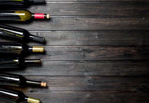 Bottles of white and red wine. photo