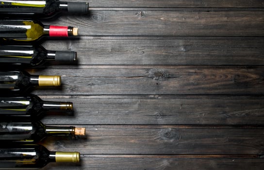 Bottles of white and red wine. photo